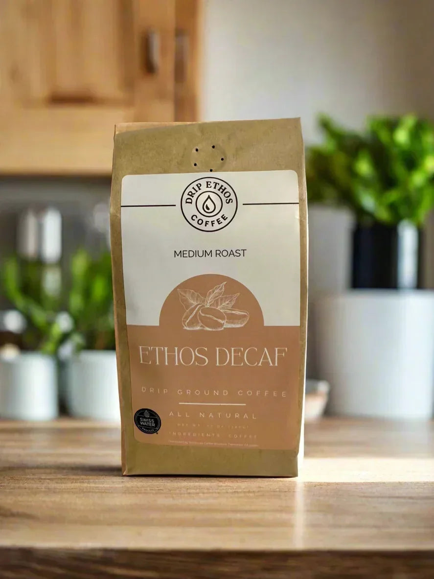 Ethos Decaf medium roast drip ground coffee bag on wooden kitchen counter